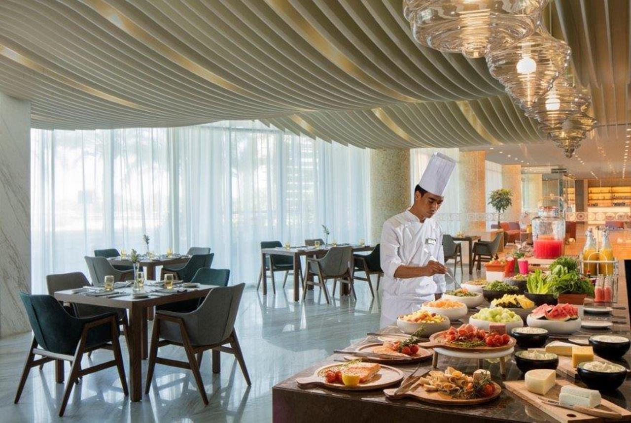 Radisson Blu Hotel Apartment Dubai Silicon Oasis מראה חיצוני תמונה