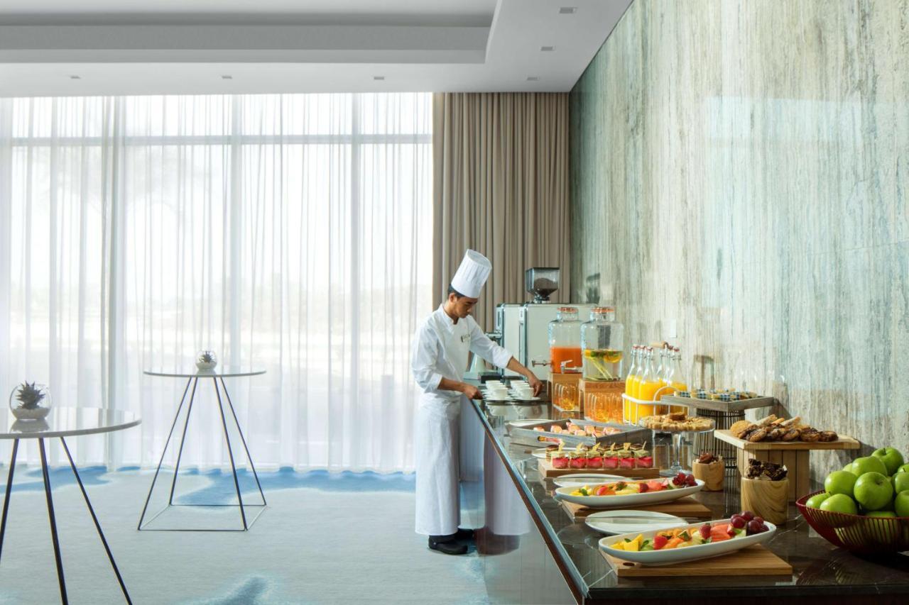 Radisson Blu Hotel Apartment Dubai Silicon Oasis מראה חיצוני תמונה