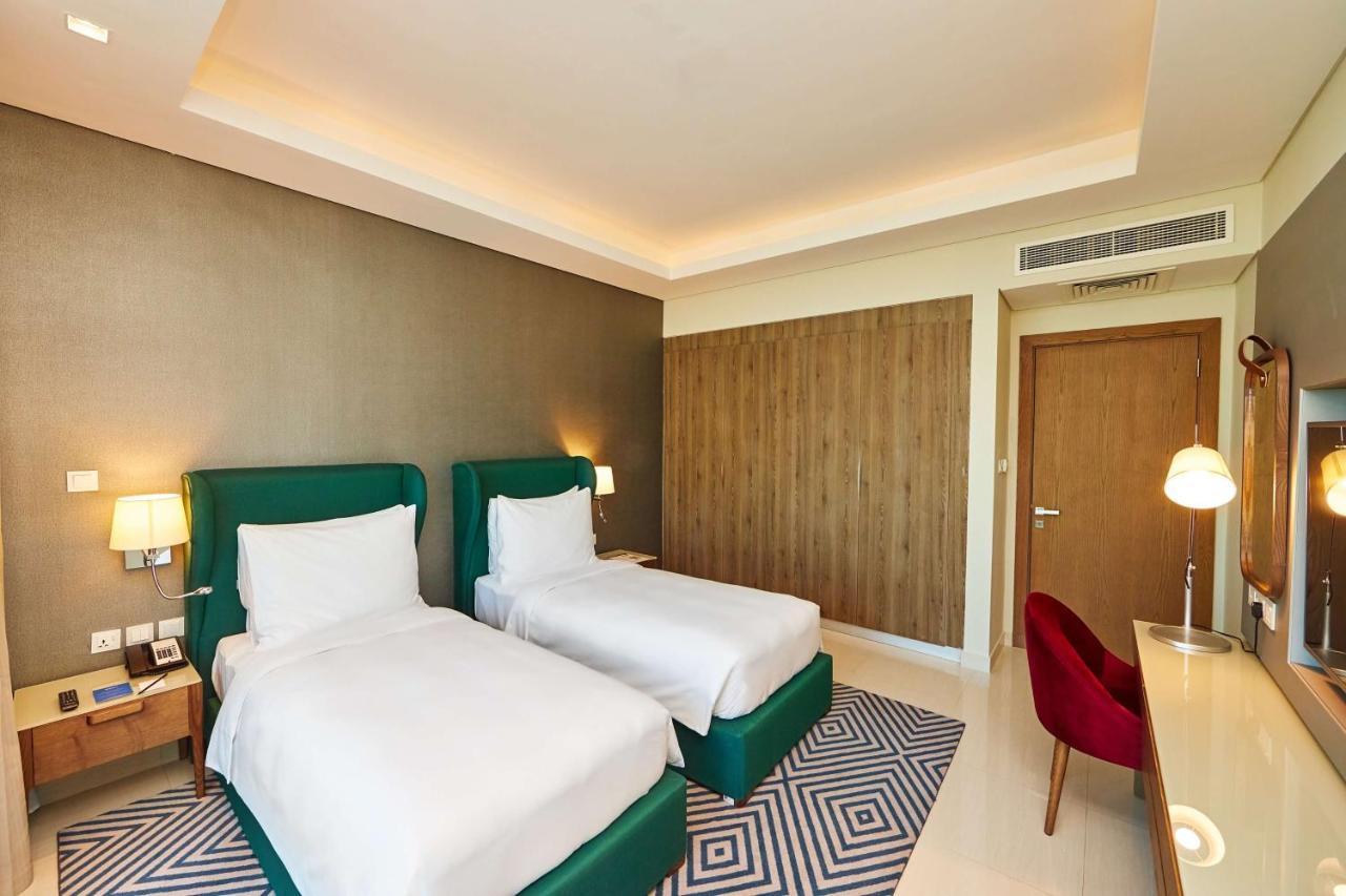 Radisson Blu Hotel Apartment Dubai Silicon Oasis מראה חיצוני תמונה